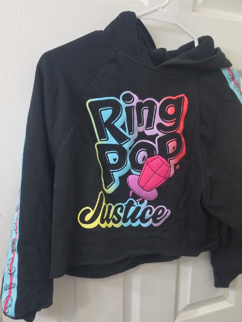 Justice Black Hoodie with Rainbow Ring Pop Graphic
